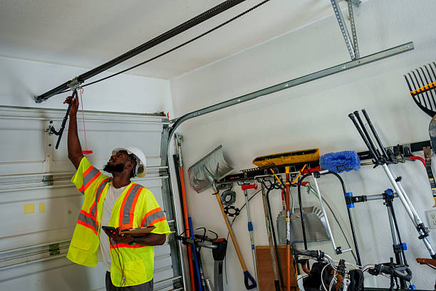 Professional Garage Door Panel Replacement technician working in Lyles, TN